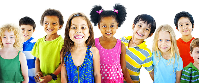 A group of diverse children with various clothing colors, posing together for a photo.